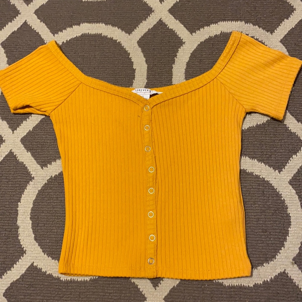Orange shirt.
